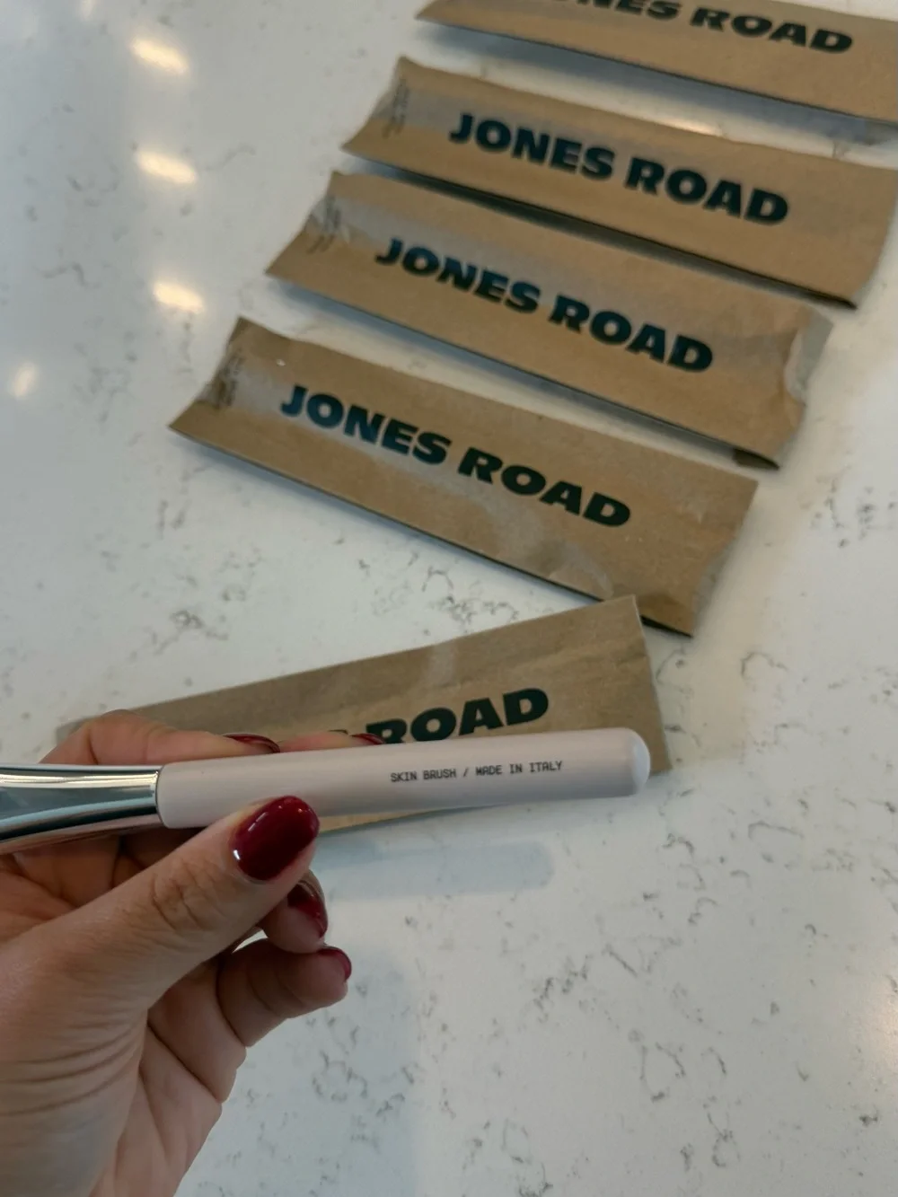 Jones Road Skin Brush with Soft White Handle and Natural Bristles